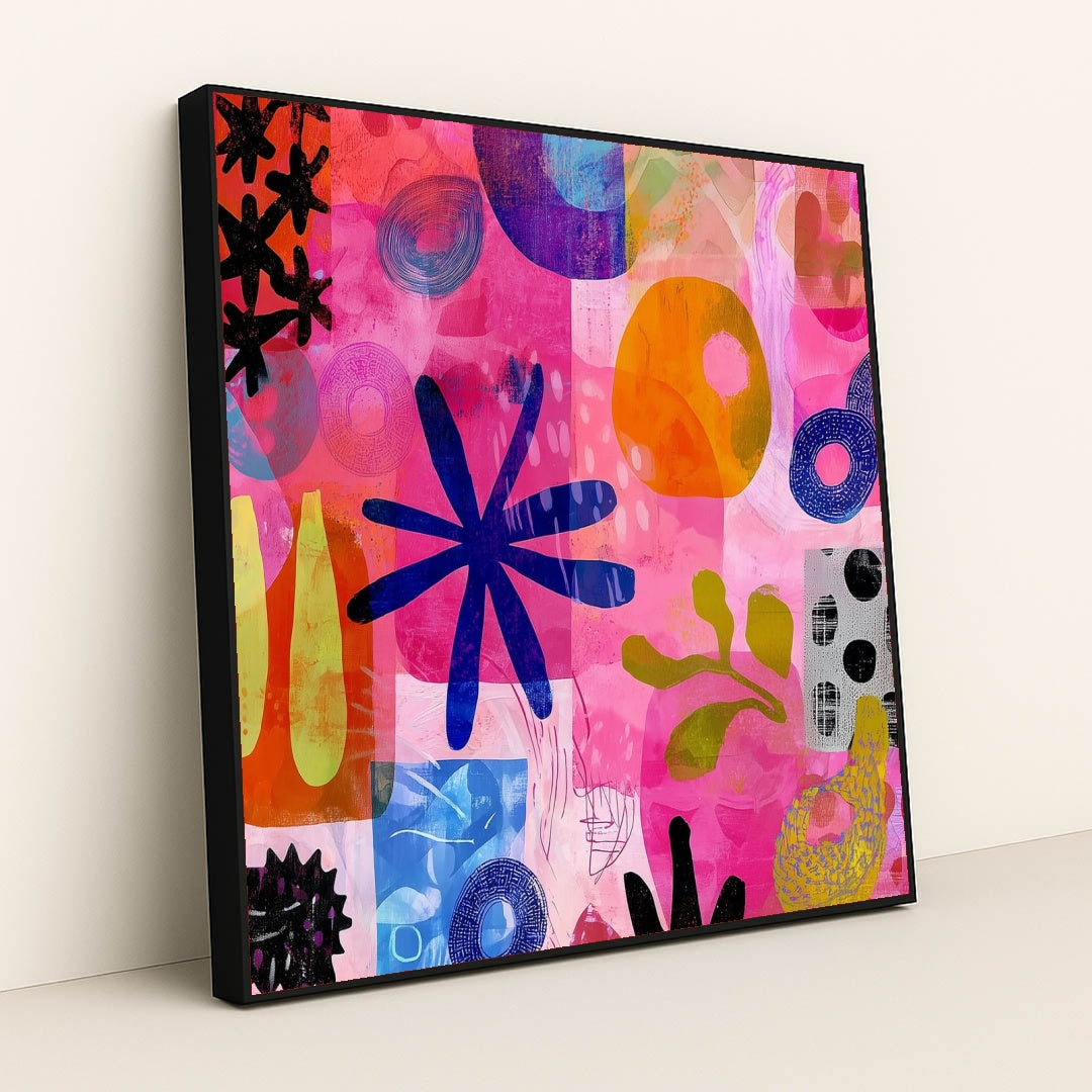 This artwork shows a colorful abstract collage with organic shapes, blue flowers, circles, and vibrant pinks and oranges, in a black frame.