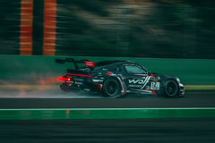Porsche GT3 Cup at Full Speed, black racing car navigating a wet track with spray, perfect car wall art.