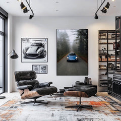 Porsche 911 in a Foggy Daydream car wall art, featuring a blue Porsche 911 on a foggy road in a modern living room.