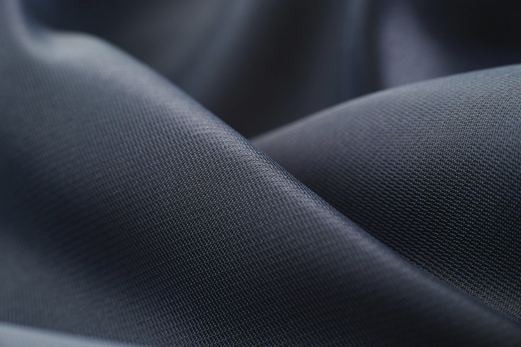 Engin Akyurt - Elegant close-up of smooth, dark satin fabric showcasing texture and sheen.
