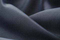 Engin Akyurt - Elegant close-up of smooth, dark satin fabric showcasing texture and sheen.