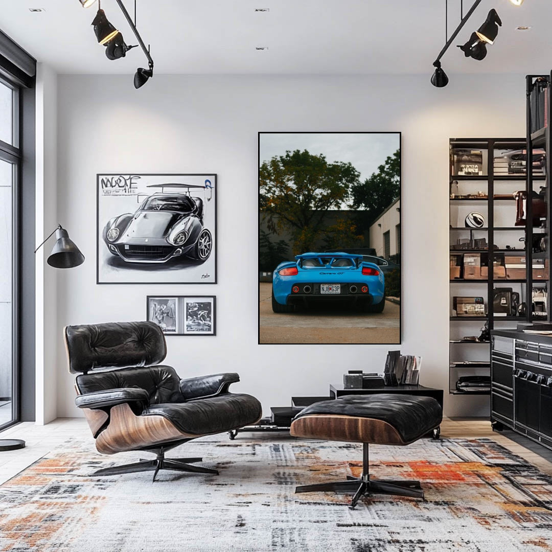 Porsche Carrera GT in Blue Steel Silence wall art displayed in a stylish modern living room.