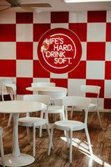 Nellie Adamyan - A red and white checkered wall in a restaurant photo