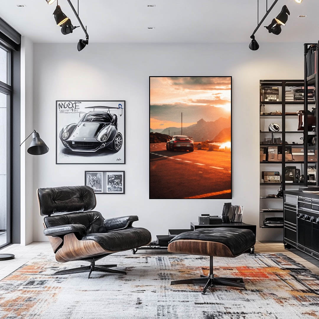 Porsche 911 GT3 Sunset Drive wall art displayed in a stylish modern living room with leather furniture.