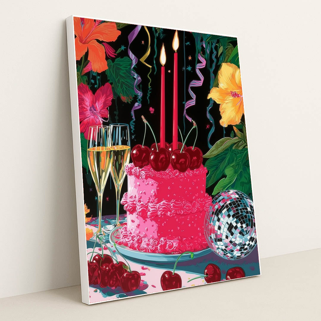 This artwork shows a festive pink cake with cherries, two lit candles, champagne glasses, a disco ball, and colorful hibiscus flowers, in a white frame.