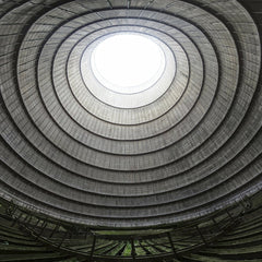 Wendelin Jacober - A stunning view of a modern circular industrial dome with a spiral pattern and natural lighting.