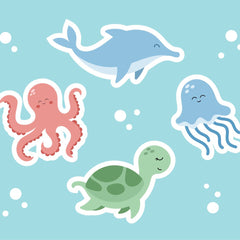 Adri Ansyah - A group of sea animals floating in the water