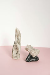 Mikhail Nilov - A minimalist composition featuring crystals and driftwood, perfect for art and decor.