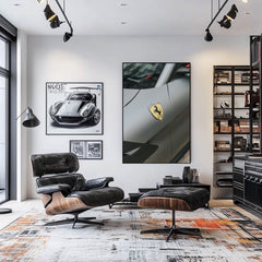 The Ferrari Crest in Matte Silver decorates a stylish office with car wall art showcasing sleek design and elegance.