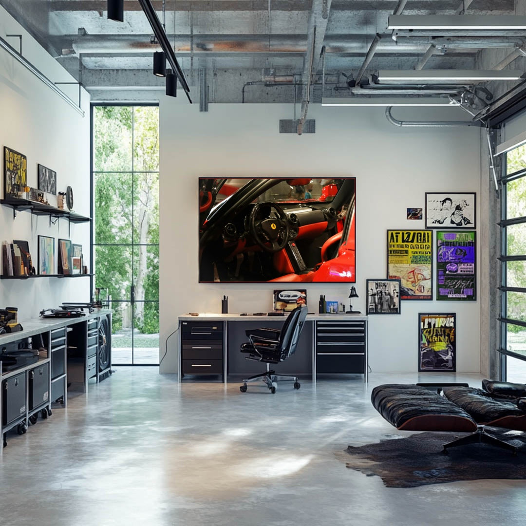 Ferrari Cockpit in Red and Black displayed as car wall art in a stylish workspace.