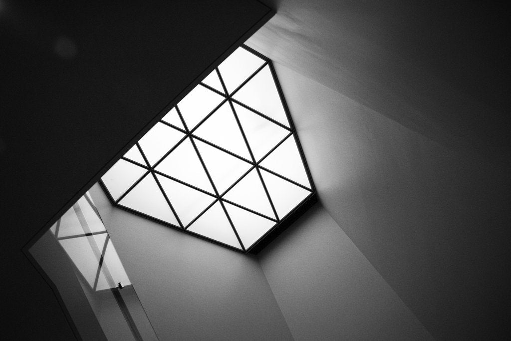 David Yu - Black and white geometric ceiling design showcasing modern architectural style.