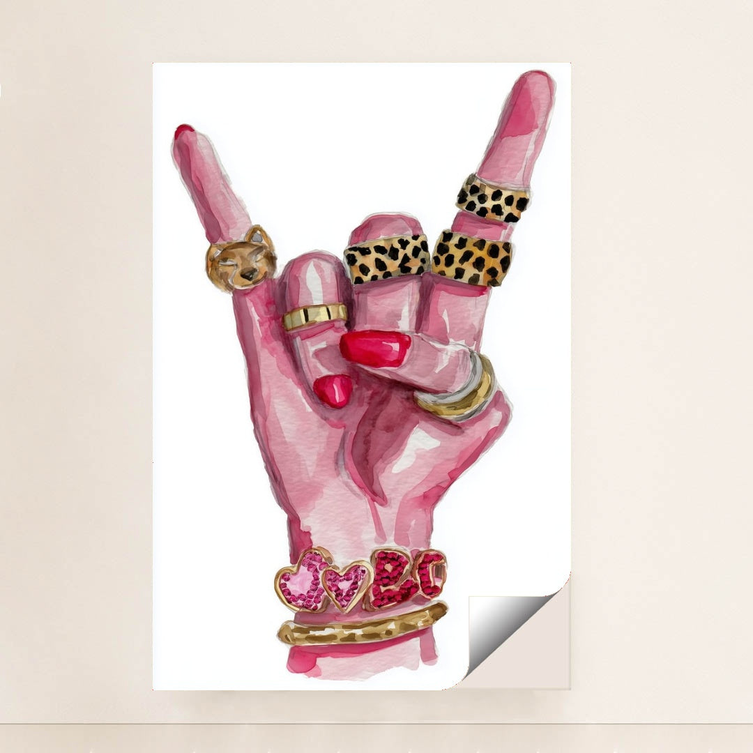 This artwork shows a hand with pink nails making a rock gesture, adorned with gold and animal print rings, and heart bracelets, minimalist unframed style.