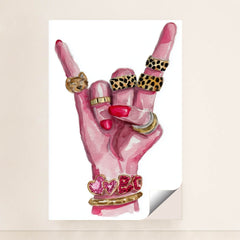 This artwork shows a hand with pink nails making a rock gesture, adorned with gold and animal print rings, and heart bracelets, minimalist unframed style.