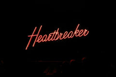 Matthew Kwong - Heartbreaker neon signage on black background photo