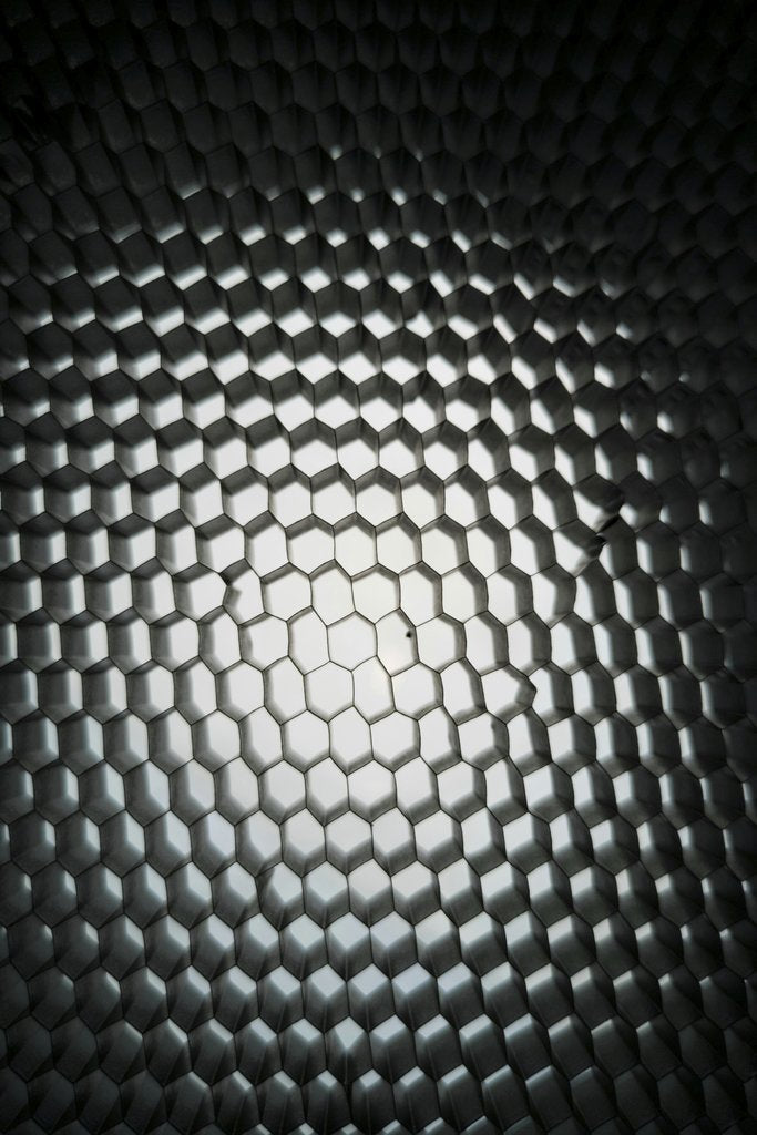 Engin Akyurt - Dynamic geometric honeycomb pattern with metallic texture and gradient lighting.