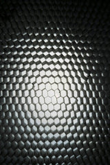 Engin Akyurt - Dynamic geometric honeycomb pattern with metallic texture and gradient lighting.