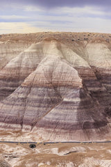 Alex Gonzo - Vertical shot of colorful eroded hills in the Painted Desert, Arizona.