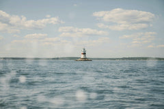 Diogo Miranda - Beautiful view of the Latimer Reef Lighthouse amidst sea and sky.