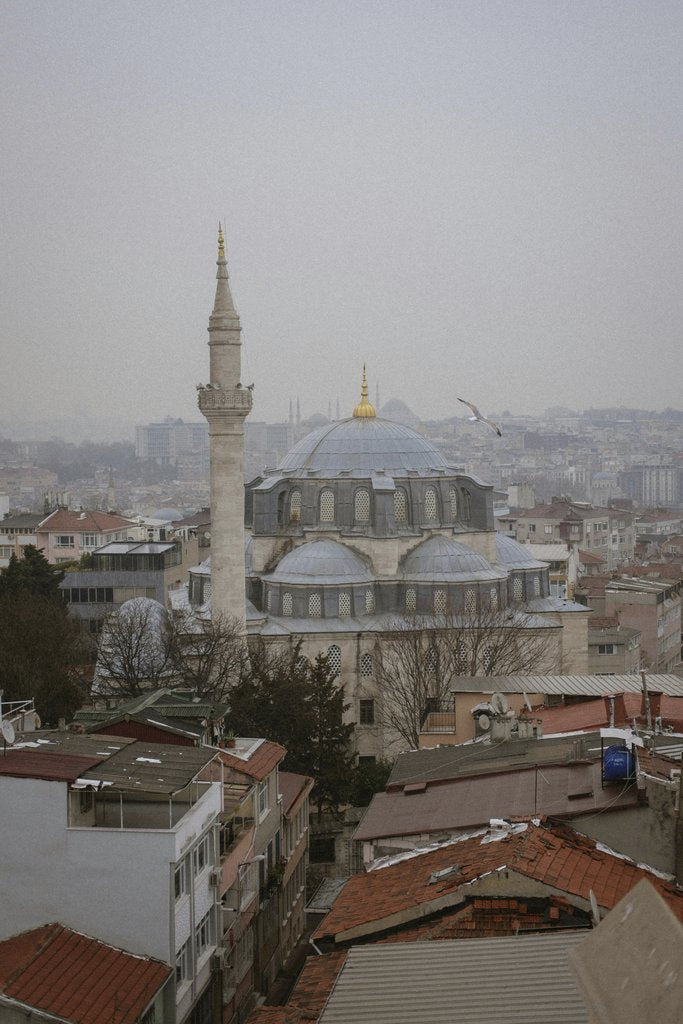 Kübra Kuzu - Overhead view of Rustem Pasha Mosque amidst Istanbul's urban skyline, showcasing historic architecture.