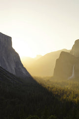 Luis Guevara - A stunning sunset over Yosemite Valley with El Capitan and Half Dome, showcasing nature's beauty.