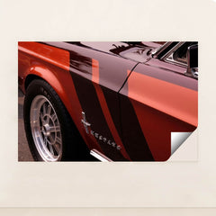 This artwork features a close-up of a classic red Ford Mustang with black and red racing stripes, unframed.