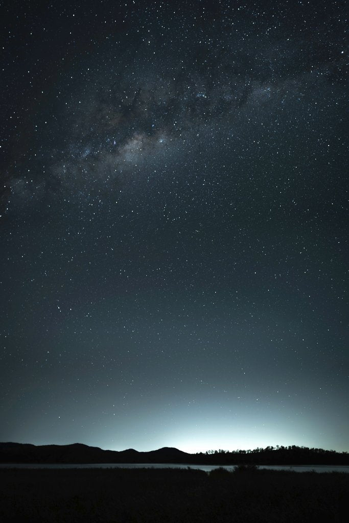 Nate Biddle - Captivating view of the Milky Way illuminating the night sky over Somerset Dam, QLD, Australia.