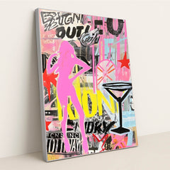 This artwork shows a vibrant street-art style collage with a pink silhouette, martini glass, stars, and layered graffiti text, in a silver frame.