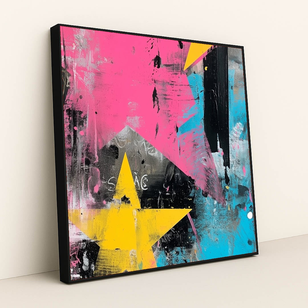 This artwork shows an abstract artwork with large yellow stars, pink and blue brushstrokes, and black and white textures, in a black frame.