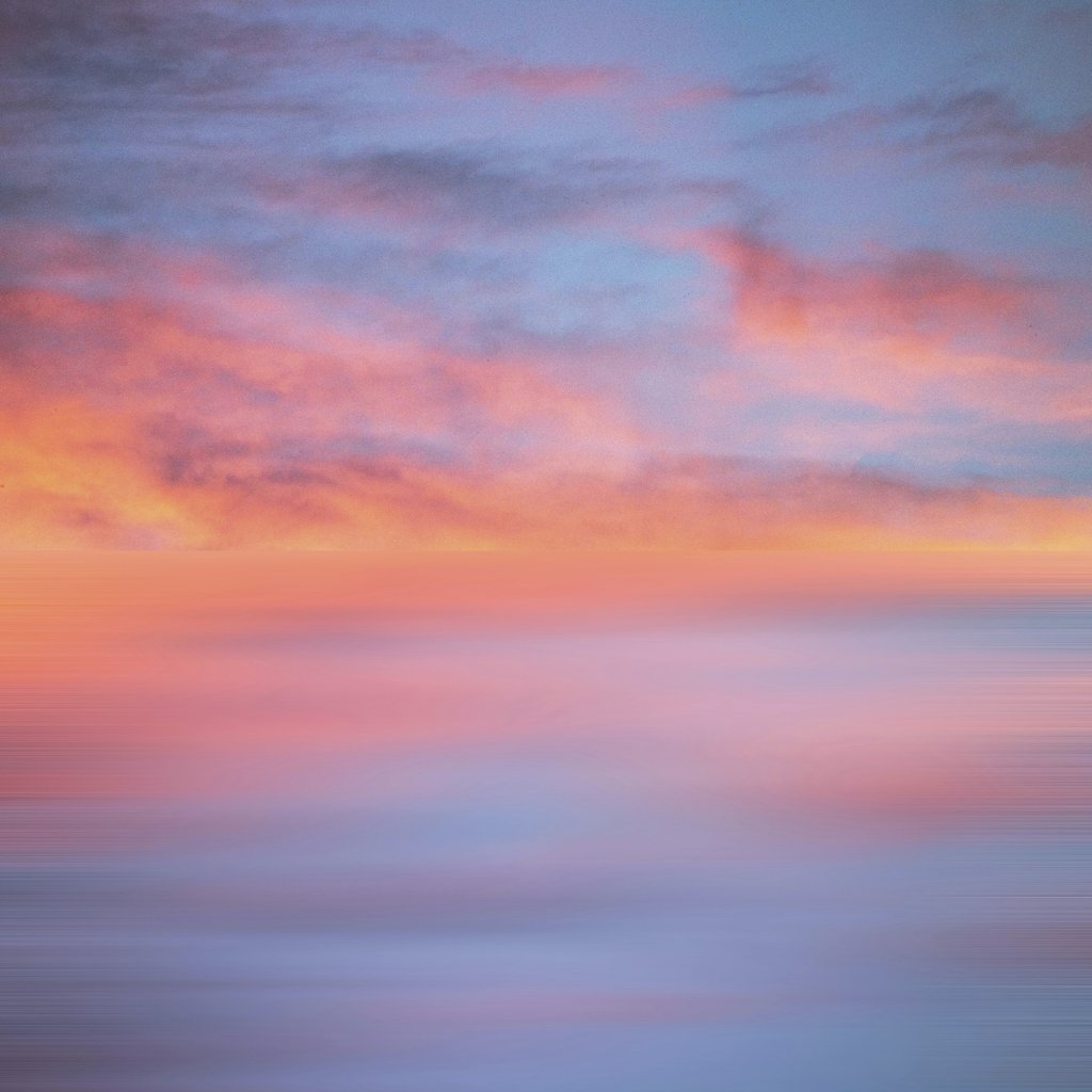 Animesh Srivastava - A vibrant and serene depiction of a sunset sky with vivid pink and blue hues.
