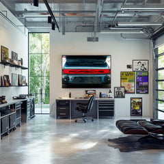Porsche Carrera Rear in Focus showcased as car wall art in a modern office setting with industrial decor.