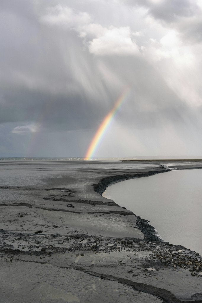 Matt Hardy - A breathtaking view of a rainbow over Mont Saint-Michel's coastline in Normandy, France.