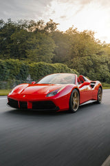 Crusin' Ferrari 488 Spider speeding on the road, showcasing its sleek red design, perfect for car wall art.