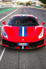 Ferrari 488 Pista on Track with red glossy finish and blue racing stripe, ideal for car wall art.