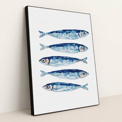 Blue Fin Row artwork features five blue and silver fish illustrated in a row on a white textured background, displayed in a black frame.