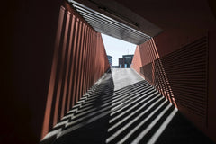 Wolfgang Weiser - Dramatic interplay of light and shadows in a modern urban tunnel in Hamburg.