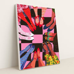 This artwork shows a circle of people with brightly patterned shoes and stockings standing on a pink and black checkerboard floor, in a white frame.