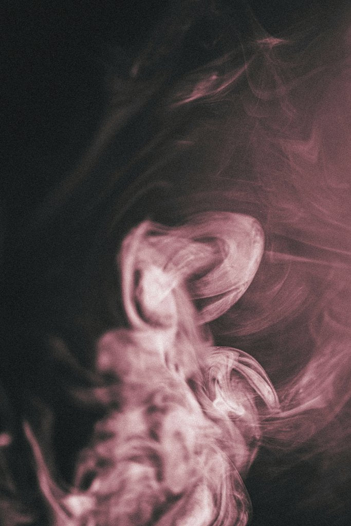 Safak Batura - Abstract pink smoke swirling on a dark background, creating mystical patterns and textures.