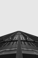 Josué Rodríguez - Abstract perspective of a steel architectural structure captured in black and white.