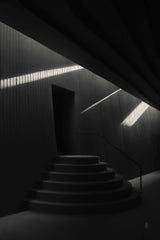taha balta - Artistic black-and-white photo of a modern staircase with dramatic lighting.