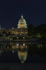 Hugo Magalhaes - Stunning night view of the US Capitol reflected in nearby water, Washington D.C.