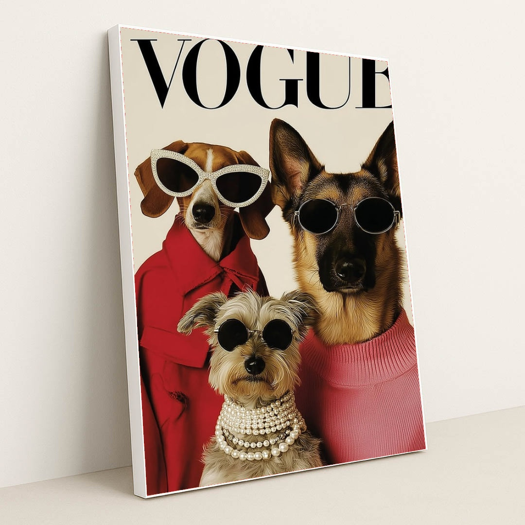 This artwork shows three stylish dogs wearing sunglasses, coats, and pearls posing on a Vogue magazine cover, in a white frame.