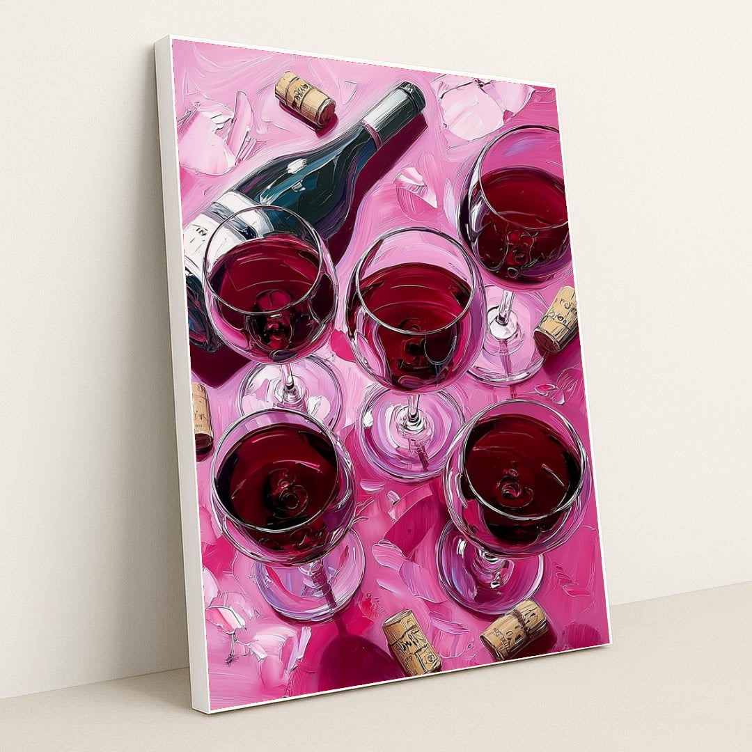 This artwork shows a wine bottle and five glasses of red wine with corks and petals on a pink surface, in a white frame.