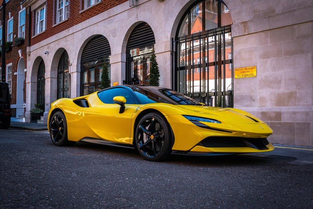 Ferrari SF90 Street Presence showcases a striking yellow sports car on a city street, highlighting its sleek design and bold colors.