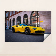 This photo shows a yellow Ferrari SF90 Stradale parked on the street in front of elegant city buildings, unframed style.