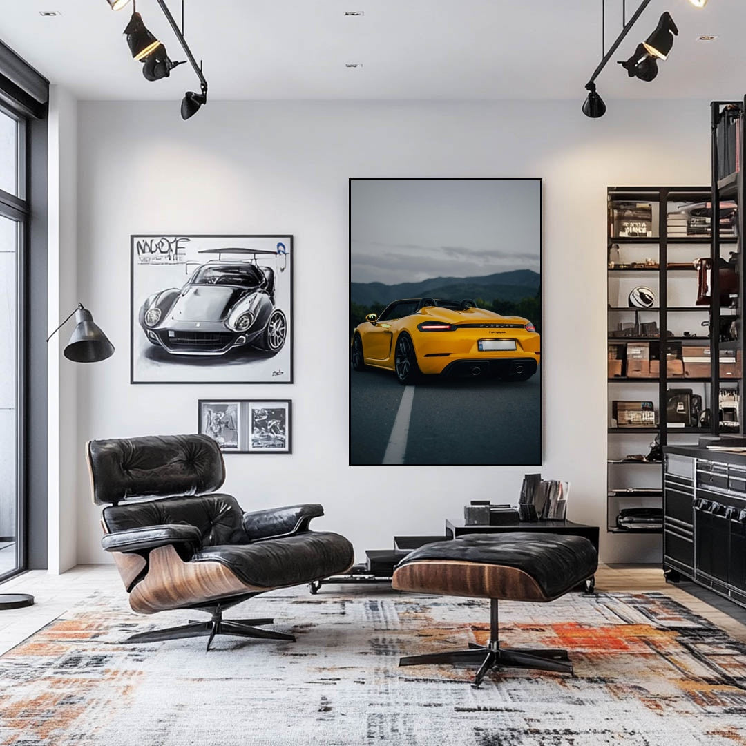 Modern living room featuring car wall art, showcasing a Racing Yellow 718 Spyder at dusk on the wall.