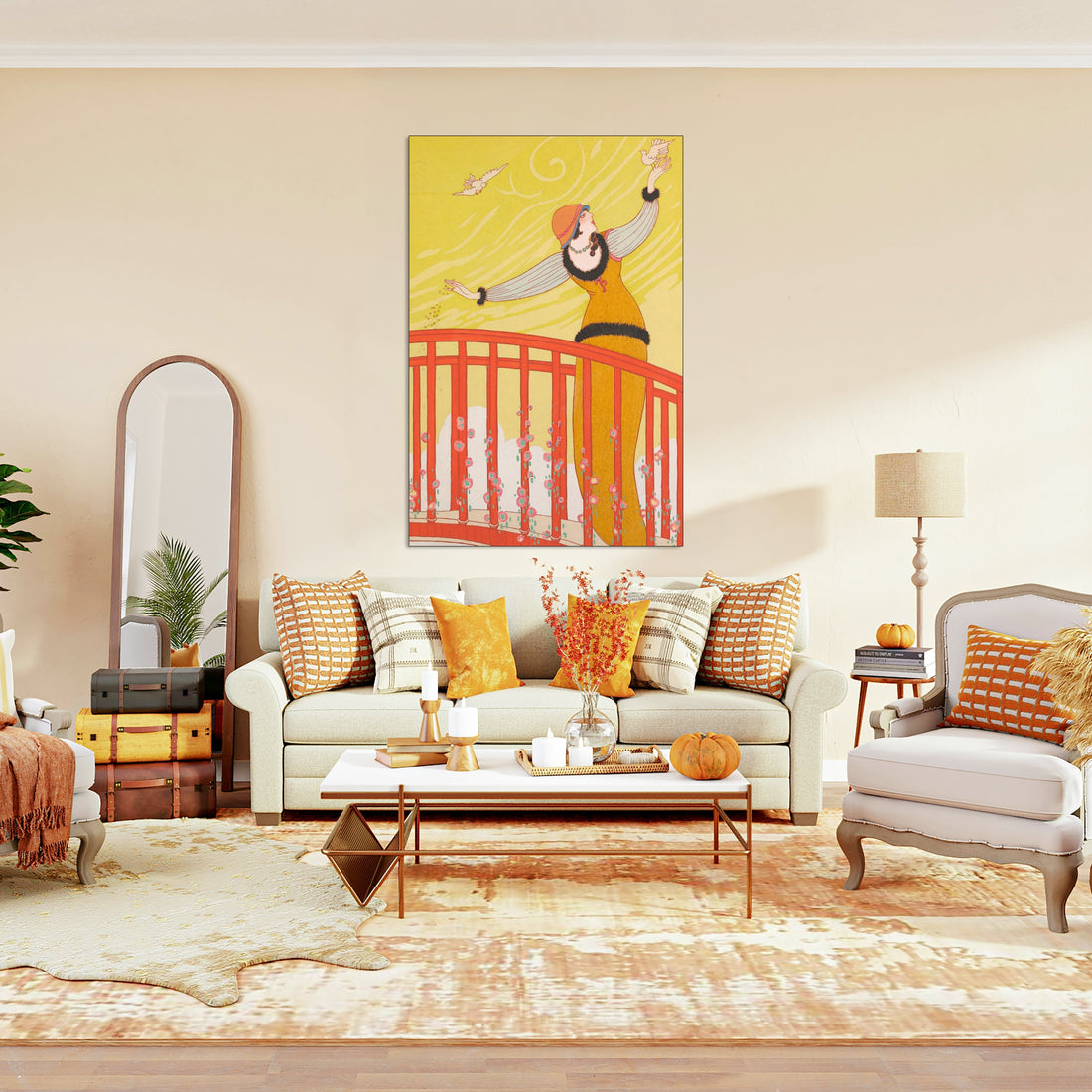 Bright living room with orange accent pillows and large vintage-style wall art above a beige sofa