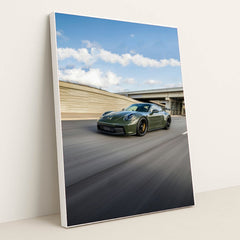 911 GT3 on the Expressway, olive green Porsche racing on a highway, showcasing car wall art with speed and precision.