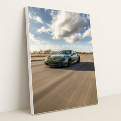 Porsche 911 on Open Highway car wall art featuring a deep green car racing down a smooth, empty road.