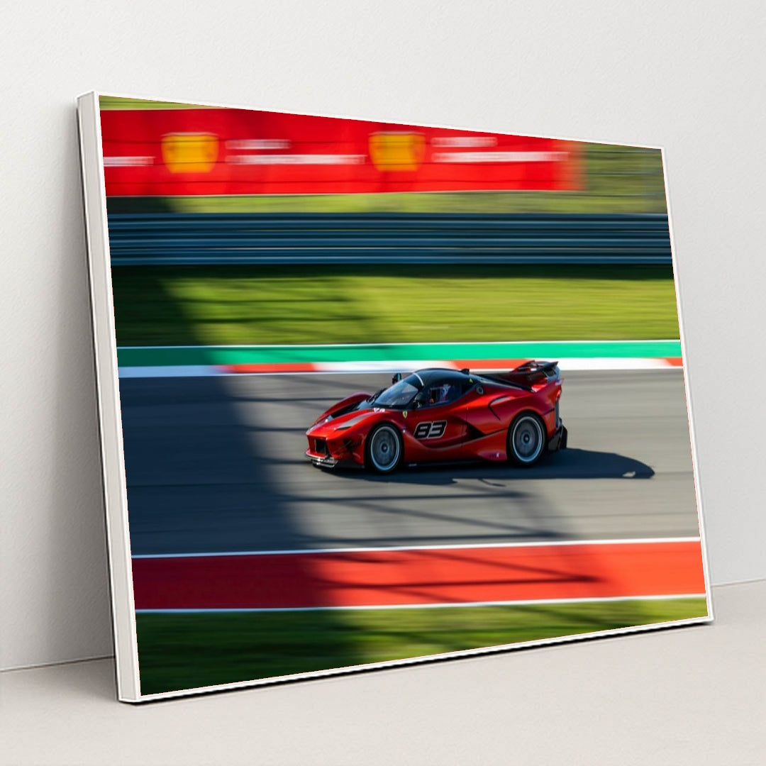 Ferrari FXX-K Evo Racing car wall art, a vivid red racing car in motion on the racetrack with a blurred background.