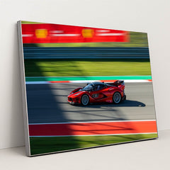 Ferrari FXX-K Evo Racing car wall art showcasing a vivid red racing car on the racetrack.